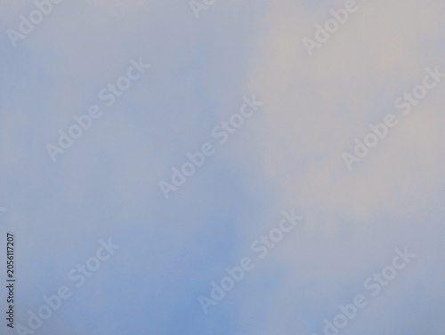 Soft blue sky with subtle cloud patterns clouds texture