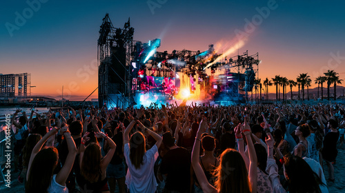 Outdoor Summer Music Festival – Massive Concert Crowd at Sunset with Live Stage Lights and Festival Atmosphere