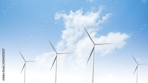 Wind mill power energy farm generator renewable sustainable field on blue sky, environment eco system technology industry ecology electricity power propeller turbine clean carbon.