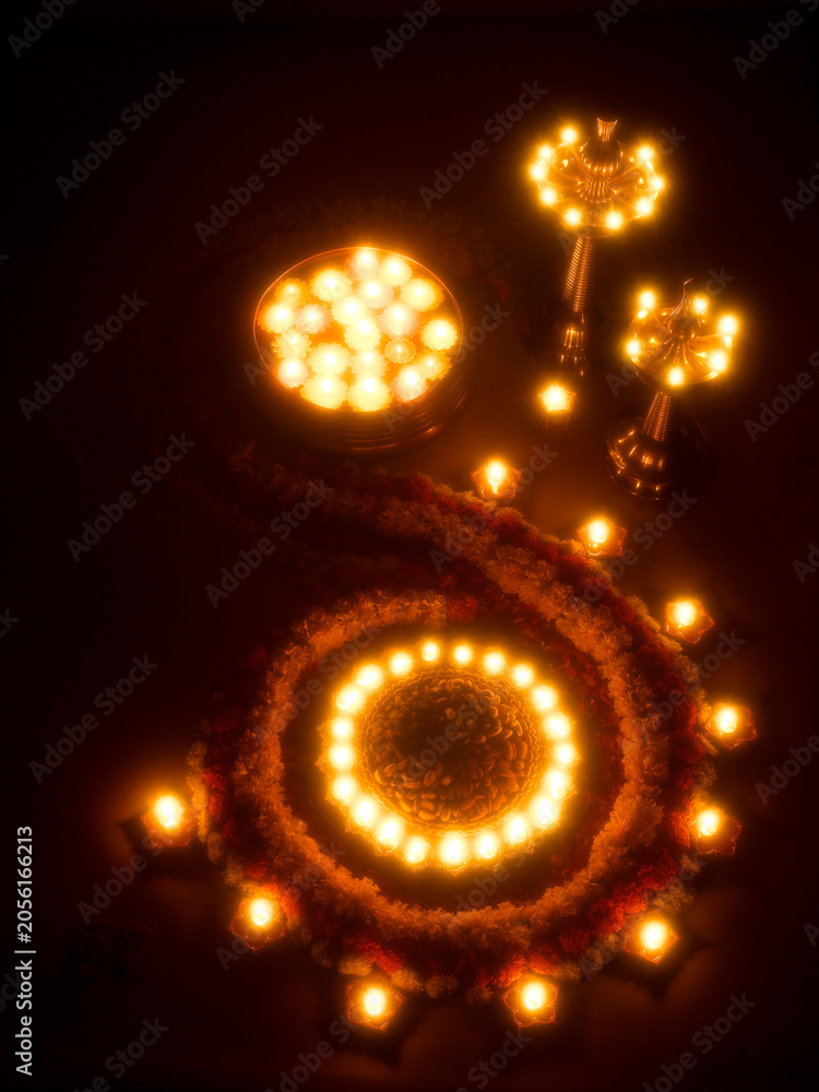 Naklejka premium oil lamps and flower arrangement