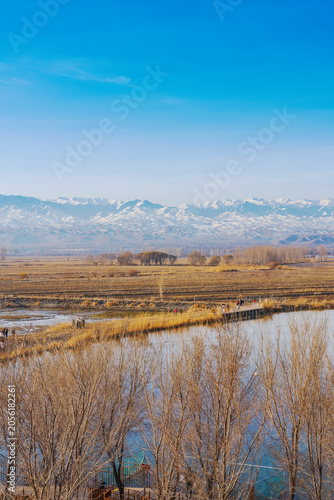 The natural beauty of the Tianshan Mountains and Swan Lake in winter in Xinjiang, China on March 3, 2023