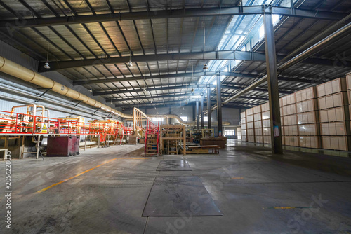 Plate processing machinery and equipment are located in a factory in North China