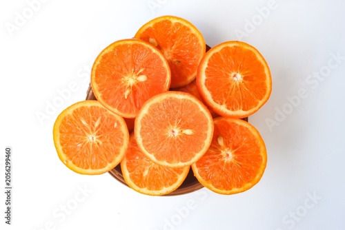 Slika na platnu top view of slices orange on white background