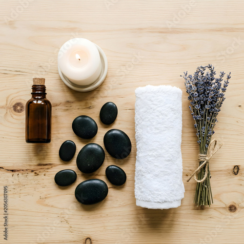 Spa and Wellness Flat Lay with Hot Stones,
Candle, Lavender and Essential Oil