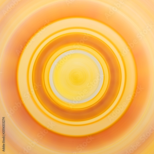 Yellow vortex, abstract circle, vortex, spiral on yellow background. The dabbing technique gives a soft focus effect due to the altered surface roughness of the paper.