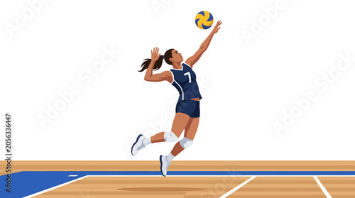 Female volleyball player spikes ball in mid-air on court