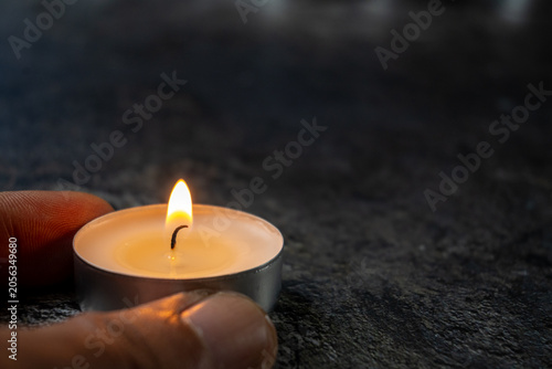 Foto Burning Tealight Candle With Copyspace