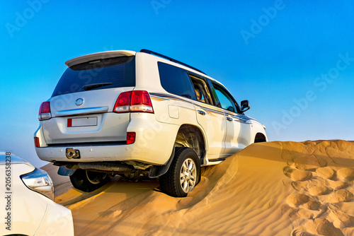 SUVs in Arabian Desert