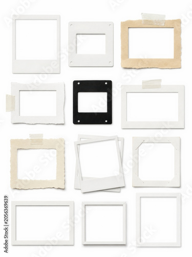 A variety of empty photo frames in different styles and colors arranged on a white background. Perfect for showcasing memories or artwork.