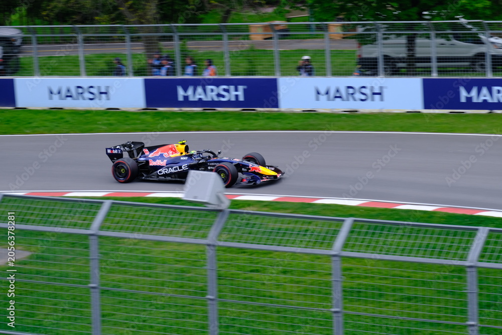 Naklejka premium May 24, 2025, Montreal, Canada: Red Bull Racing Formula 1 car during by Hadjar or Verstappen, demonstration run at Circuit Gilles Villeneuve. g.