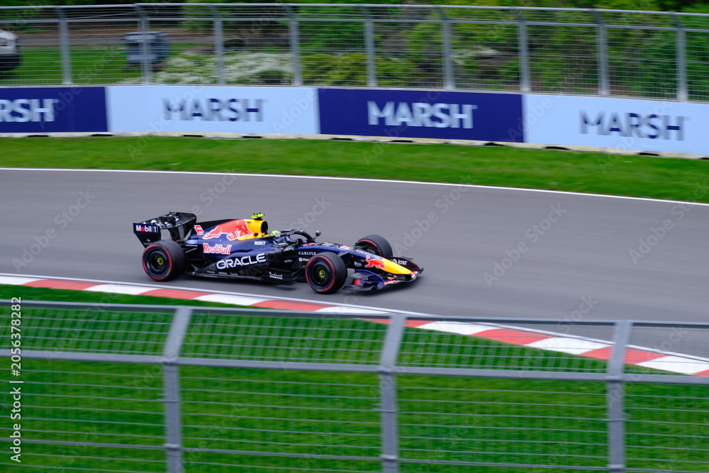 Naklejka premium May 24, 2025, Montreal, Canada: Red Bull Racing Formula 1 car during by Hadjar or Verstappen, demonstration run at Circuit Gilles Villeneuve. g.