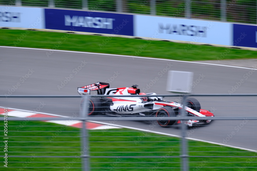 Naklejka premium May 24, 2026, Montreal, Canada - Haas Formula 1 car on track by Ocon and Bearman at Circuit Gilles Villeneuve. g.