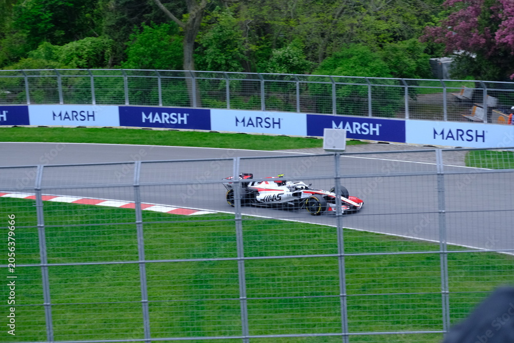 Naklejka premium May 24, 2026, Montreal, Canada - Haas Formula 1 car on track by Ocon and Bearman at Circuit Gilles Villeneuve. g.