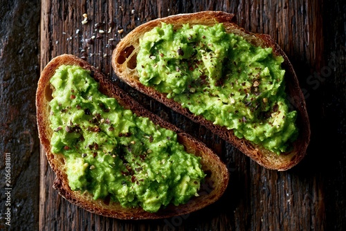 Rich avocado spread on toasted bread slices