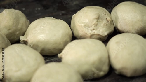 Close up shot of preparing dough for traditional laccha paratha in Indian kitchen.