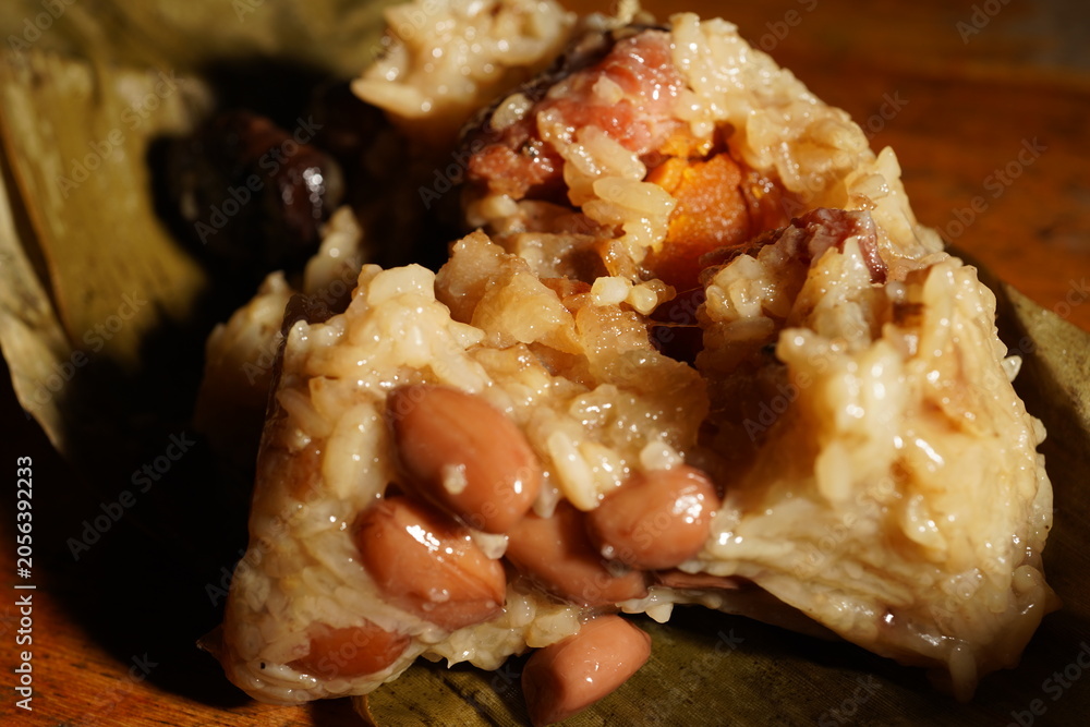 Obraz premium Macro Close Up of Traditional Taiwanese Zongzi Rice Dumpling with Peanuts and Meat