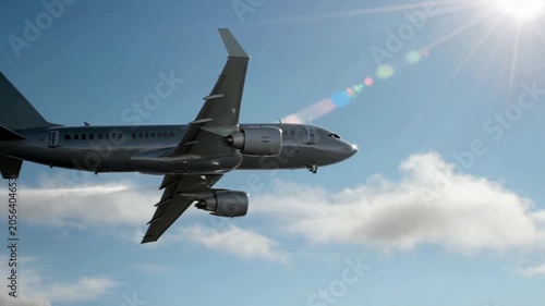 Commercial Airplane Side View Flying Through Blue Sky With Clouds