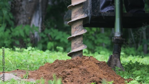 engineering geological surveys, environmental soil analysis, a drill drills into the soil