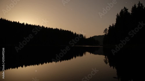 Time lapse of moon rising over Shiroka Polyana (Wide Meadow) Dam, Rhodope Mountains, Bulgaria.
