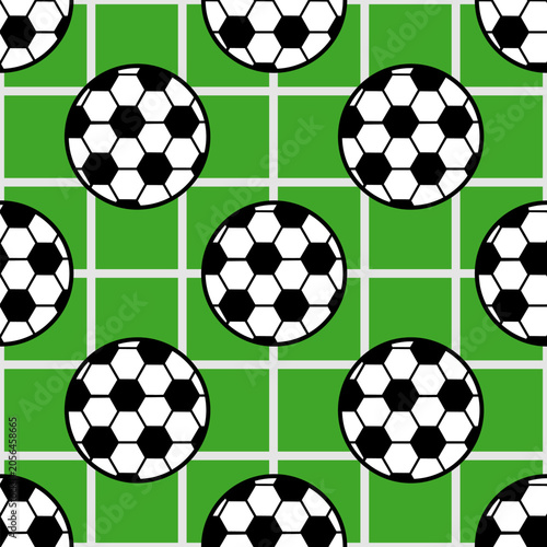 Soccer ball with seamless pattern on green background.