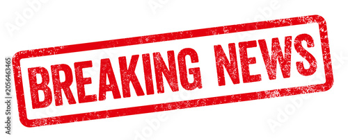 A red stamp on a white background - Breaking News