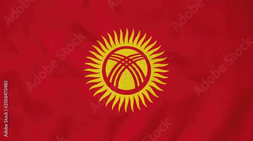 The flag of Kyrgyzstan displays a red background with a yellow sun in the center, symbolizing peace and prosperity