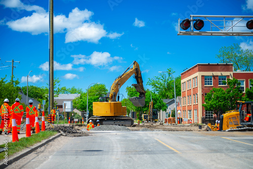 railway construction in Canada, building the renewal of a level crossing
