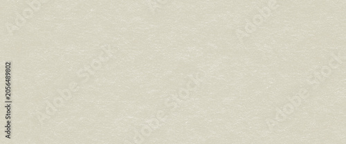 Abstract beige noise grain texture background. Rough paper surface with fine speckles. Minimalist backdrop for creative design and graphic project. Neutral color template empty canvas