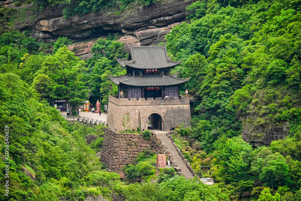 Fototapeta premium Stone staircase leading to the ancient Jianmen Guanlou gate tower at the historic Jianmen Pass, Sichuan, China