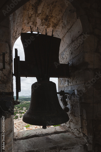 Bild auf Leinwand Ancient Bronze Bell in the Belfry of Église Haute de Banon