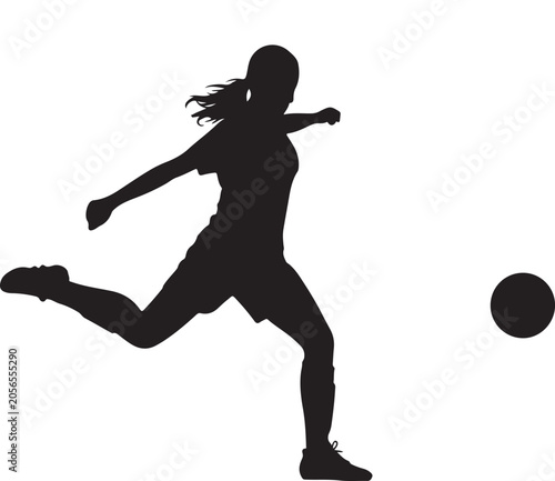 Black silhouette of a girl kicking a ball