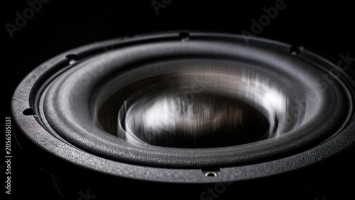 Tableau sur toile Close-up of subwoofer cone with motion blur under strobe light.