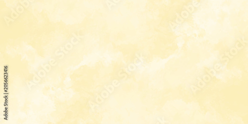 Pale yellow watercolor wash background with soft texture and blurred edges light and airy tint painting