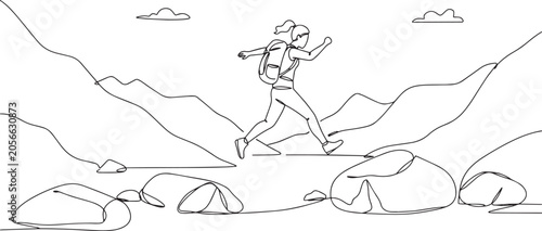 Woman Hiker Runs Across Rocks in Mountainous Terrain.