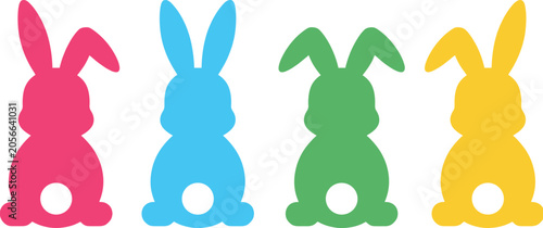 Foto Four colorful bunny silhouettes with white oval tails on white background Keywor