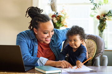 Mother and Child Share Creative Time in Home Office