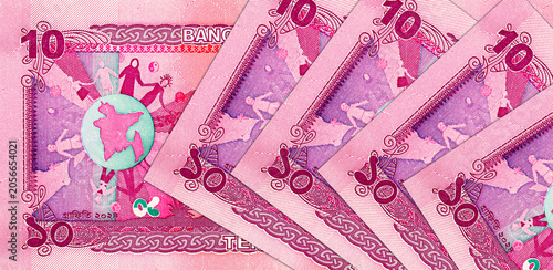 Fotografie 10 Bangladeshi Taka banknote featuring a silhouette of a person waving the national flag of Bangladesh
