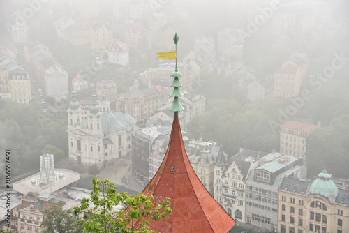Cuadro en lienzo Historic Buildings, Hills, and Forest with Mist in Spa Town Karlovy Vary, Czech