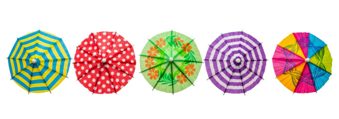 Top view of five cocktail umbrellas isolated on transparent background.