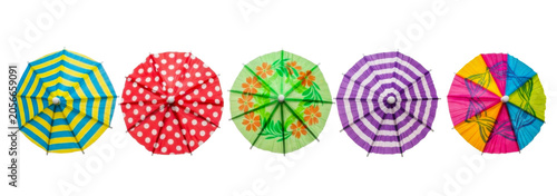 Top view of five cocktail umbrellas isolated on transparent background.