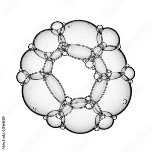 A stylized illustration of interconnected circles forming a symmetrical pattern.
