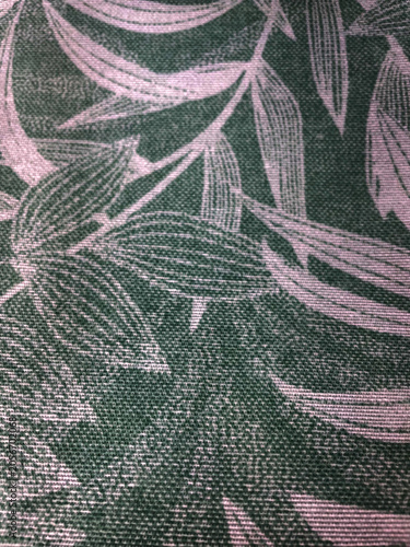Elegant botanical textile pattern featuring stylized leaves and tropical foliage in soft pink and dark green tones. Decorative fabric design ideal for upholstery, wallpaper, fashion and home decor.