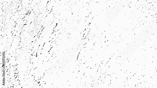Slika na platnu Distress overlay texture with scattered black specks on a white background grain