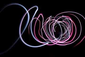 Colorful light trails forming abstract swirls