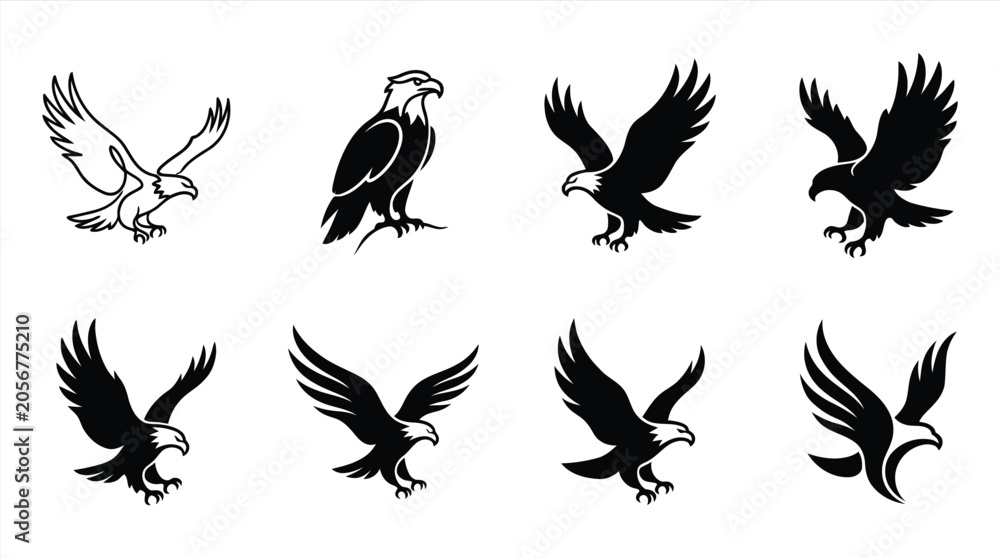 Naklejka premium Black and white eagle silhouettes flying icons Vector