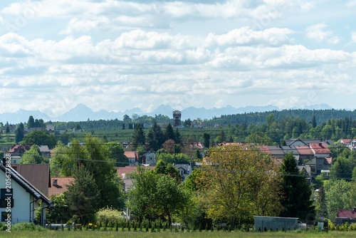 A panorama of the town and the observation tower. The Tatra Mountains are in the background.