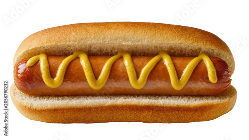 Isolated classic grilled frankfurter in a fresh bun with yellow mustard on top, appetizing food