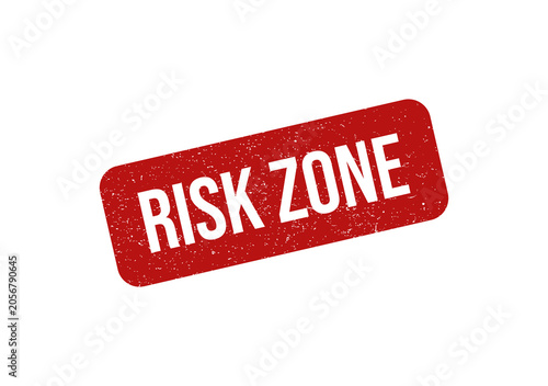 Red grunge rubber stamp seal with risk zone text on white background