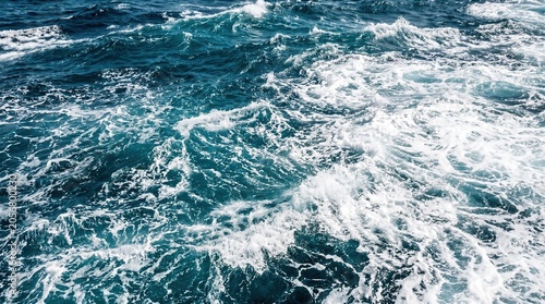 Turbulent ocean waves crashing under stormy blue waters dramatic seascape