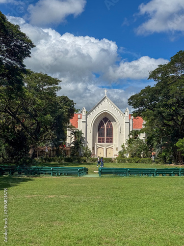 Obraz na plátně Silliman University Church facade behind a green lawn